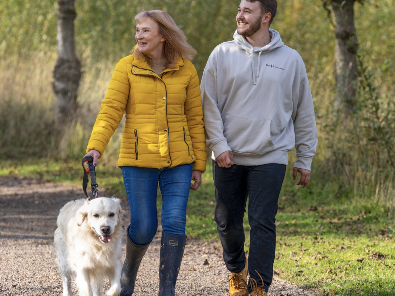 Family out walking dog