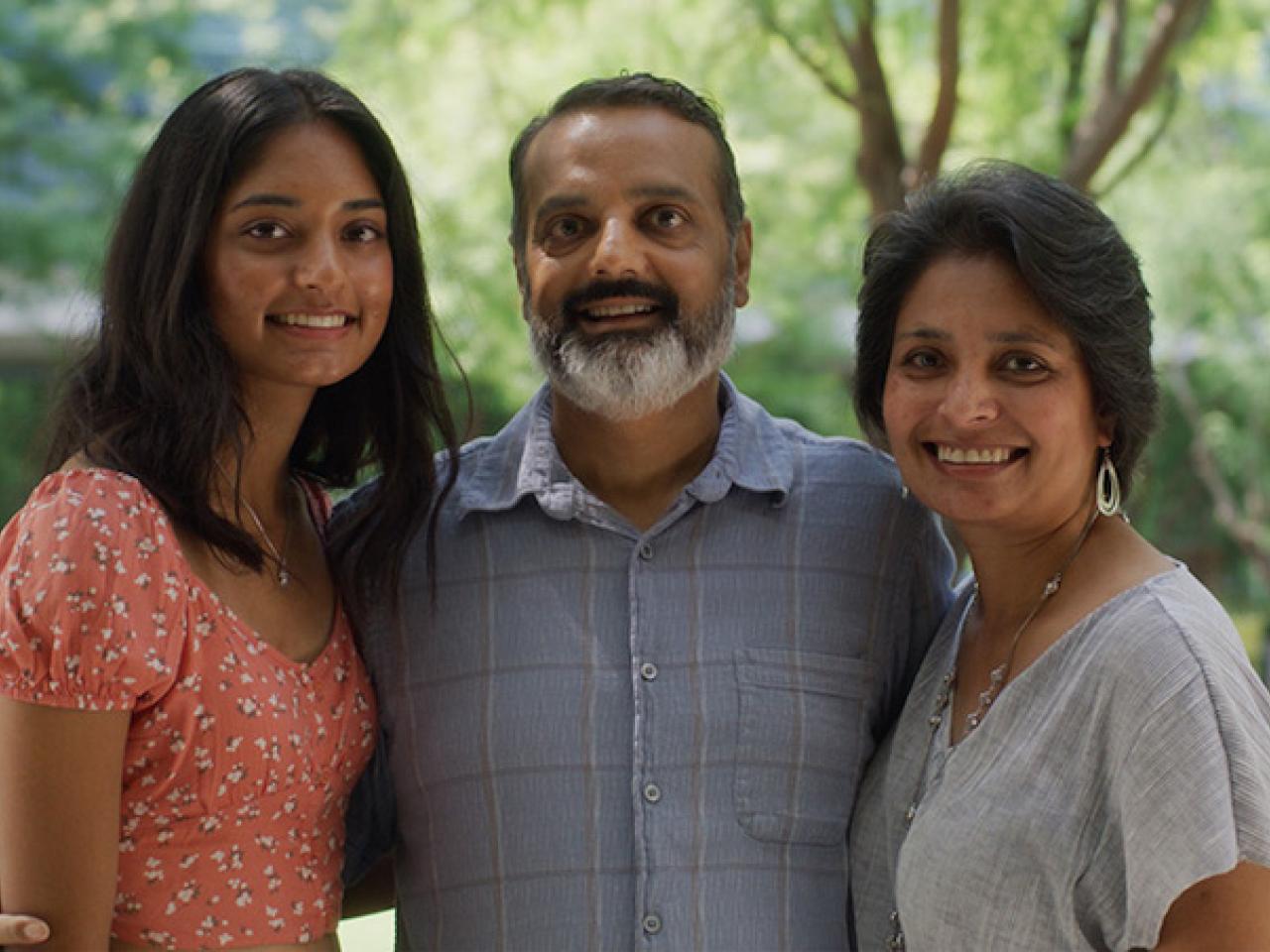 Photo of AJ Patel, his wife and daughter.
