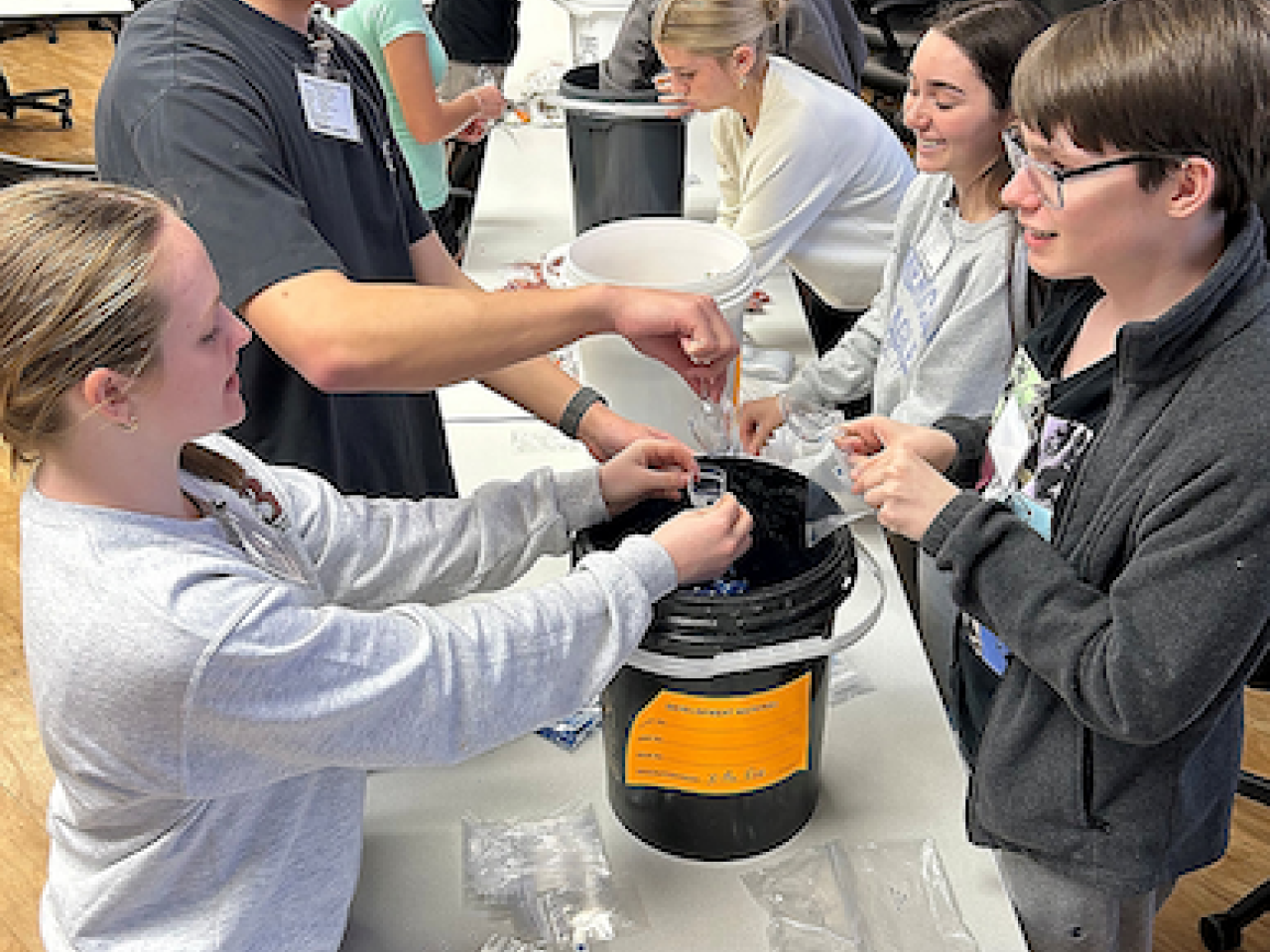 Students shown recycling.