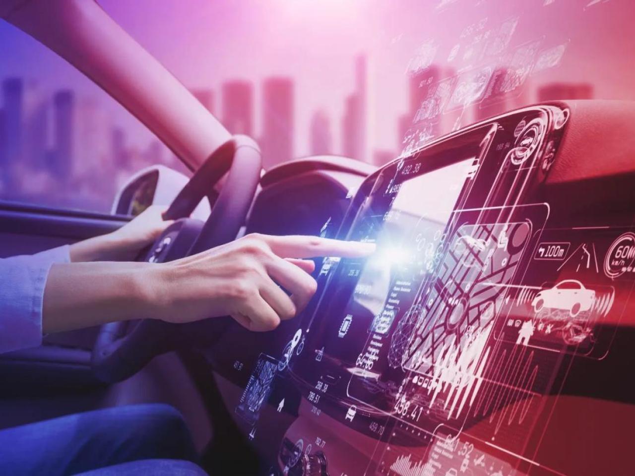 person using a console while driving