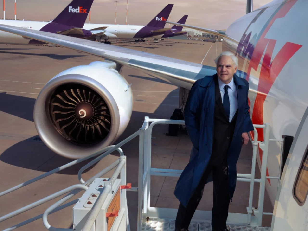 Person standing outside FedEx plane