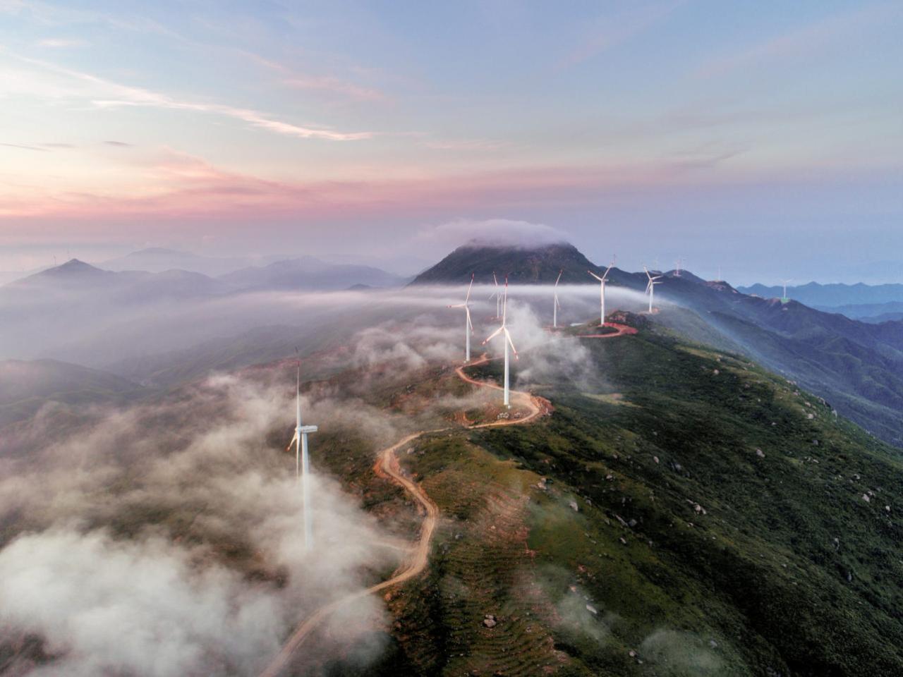 Wind turbines on a mountain top.