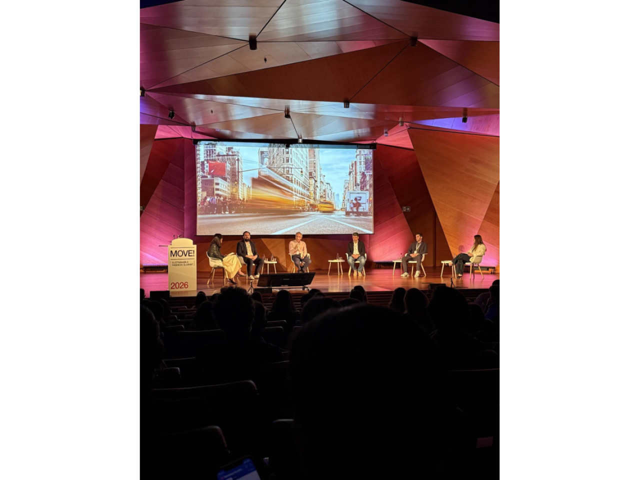 Speakers on stage at sustainability summit