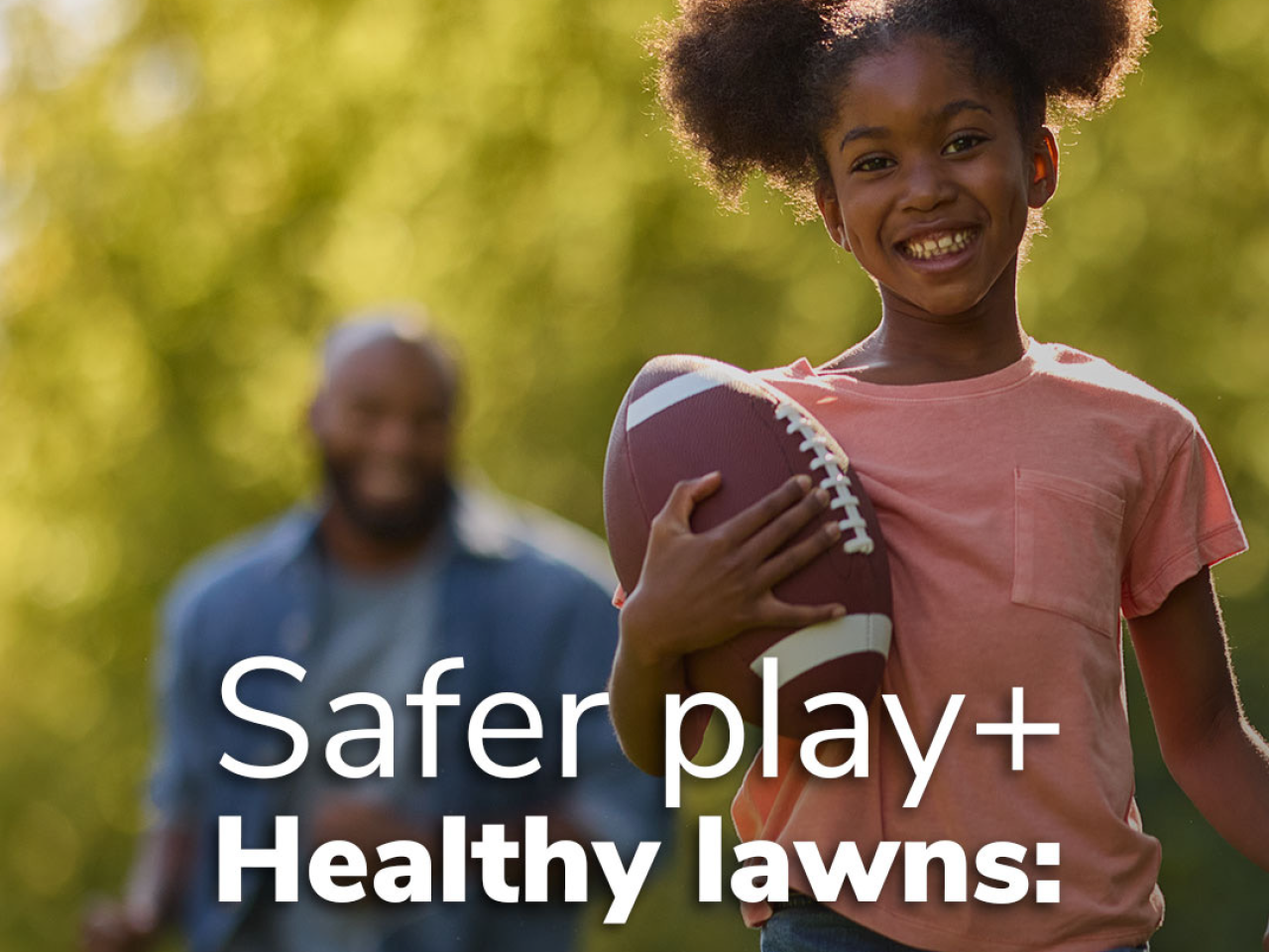 A child holding a football, with words "Safer play + Healthy lawns:"