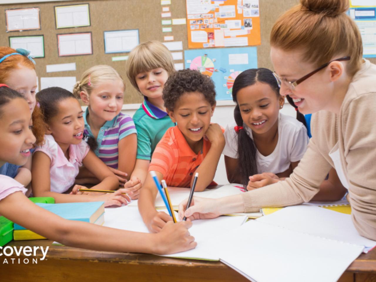 A teacher with students