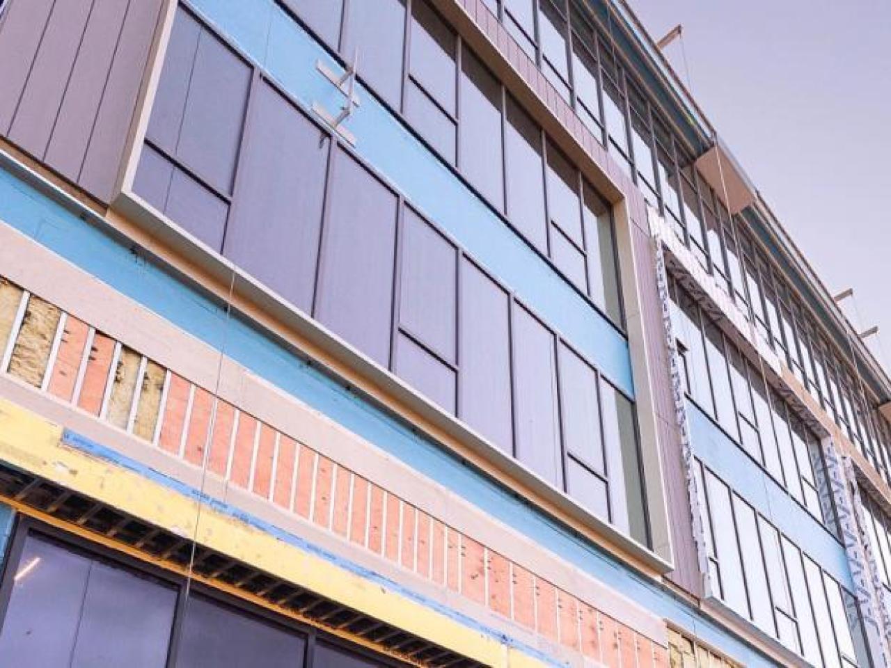 A multi-story building under construction.