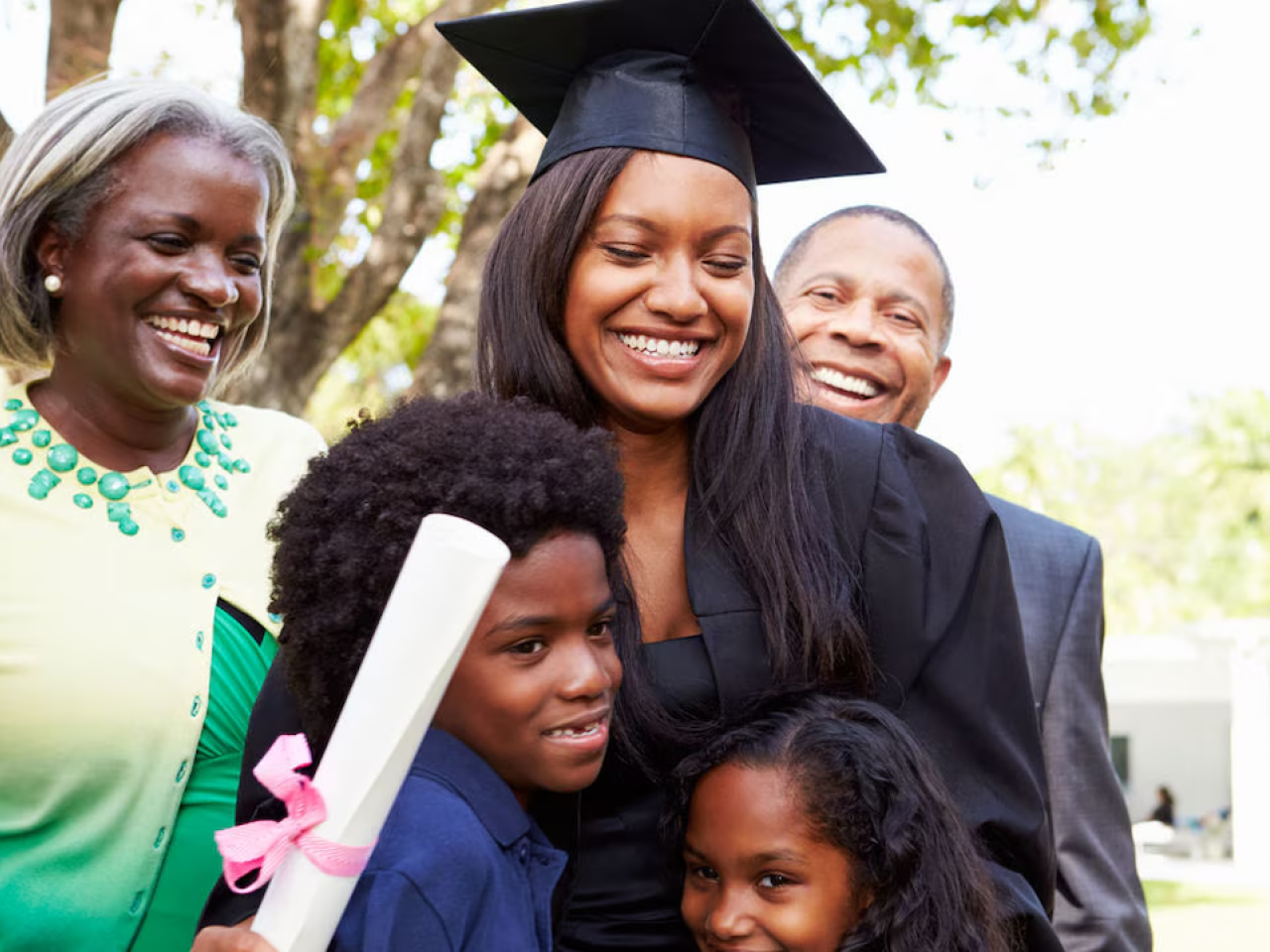 Graduate shown with her family.