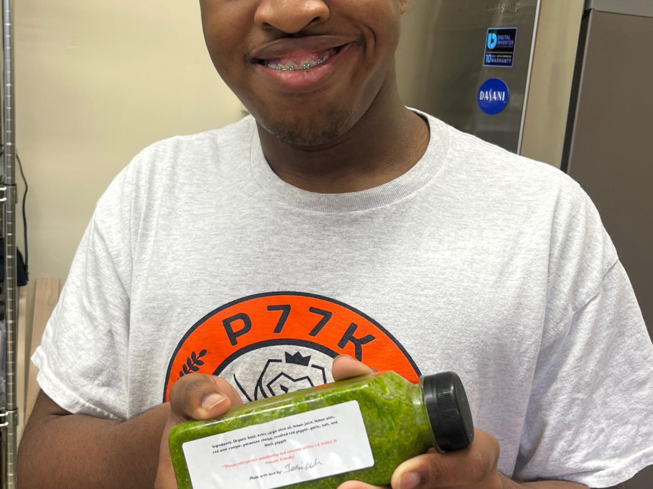 person holding up a juice