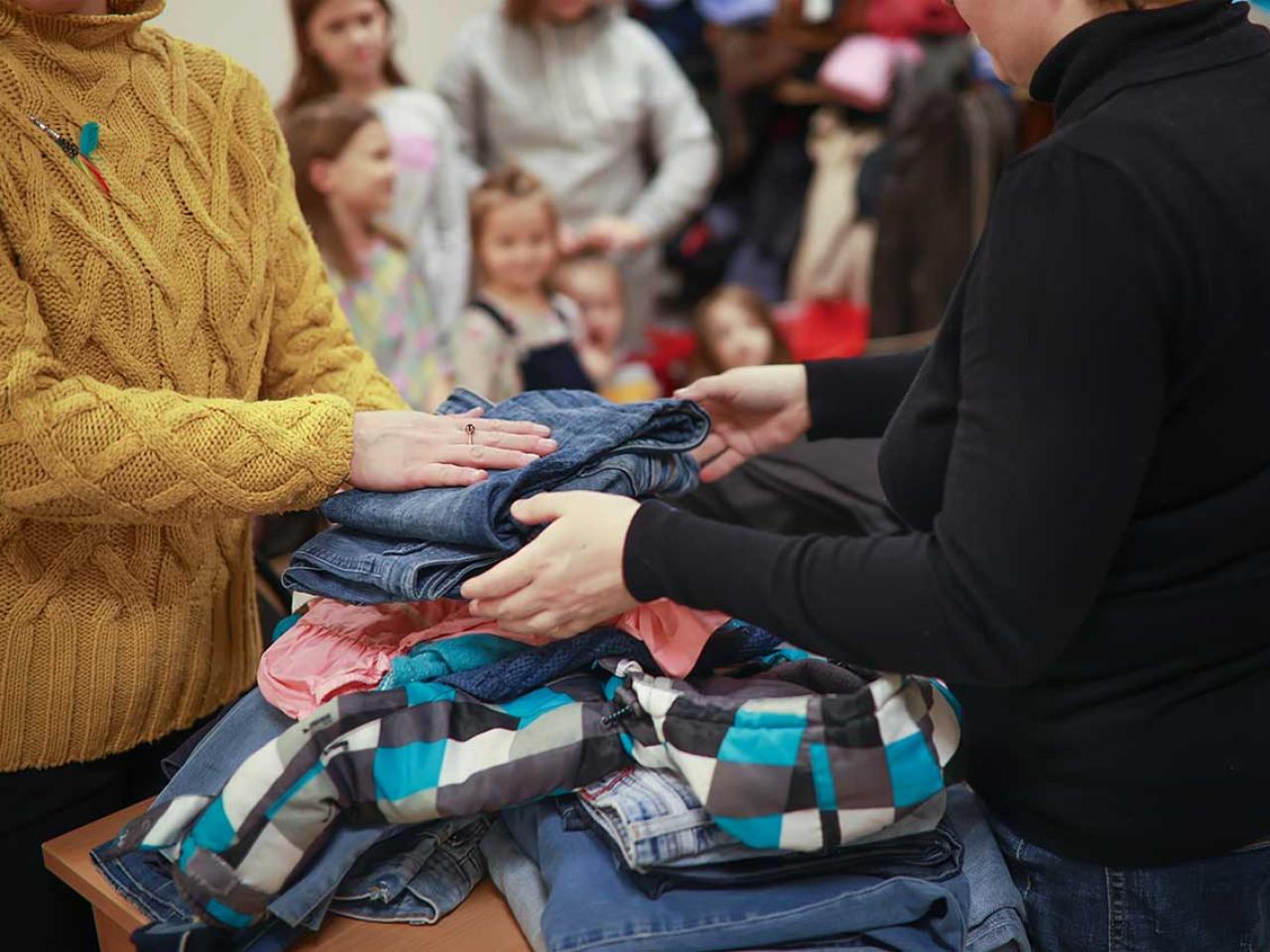 People handling clothing