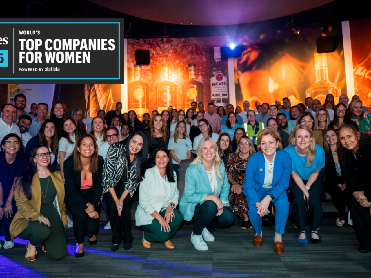 Forbes 2025 Top Companies for Women logo over a group photo
