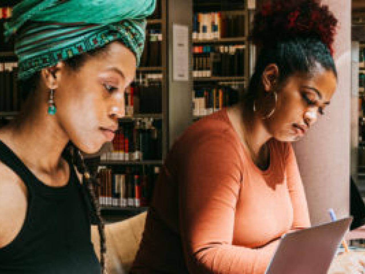 People studying in a library