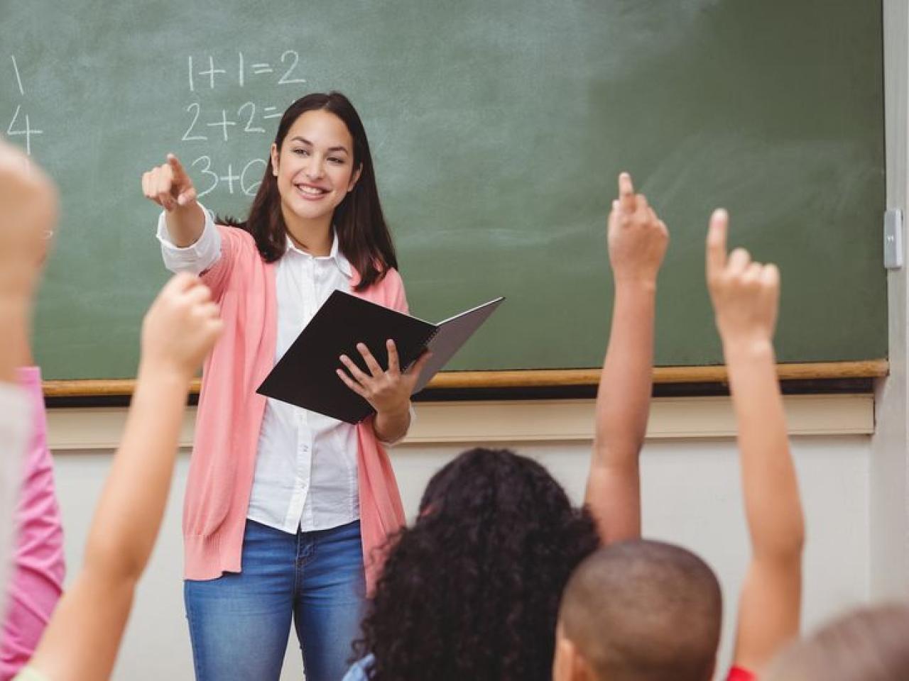 teacher in front of classroom