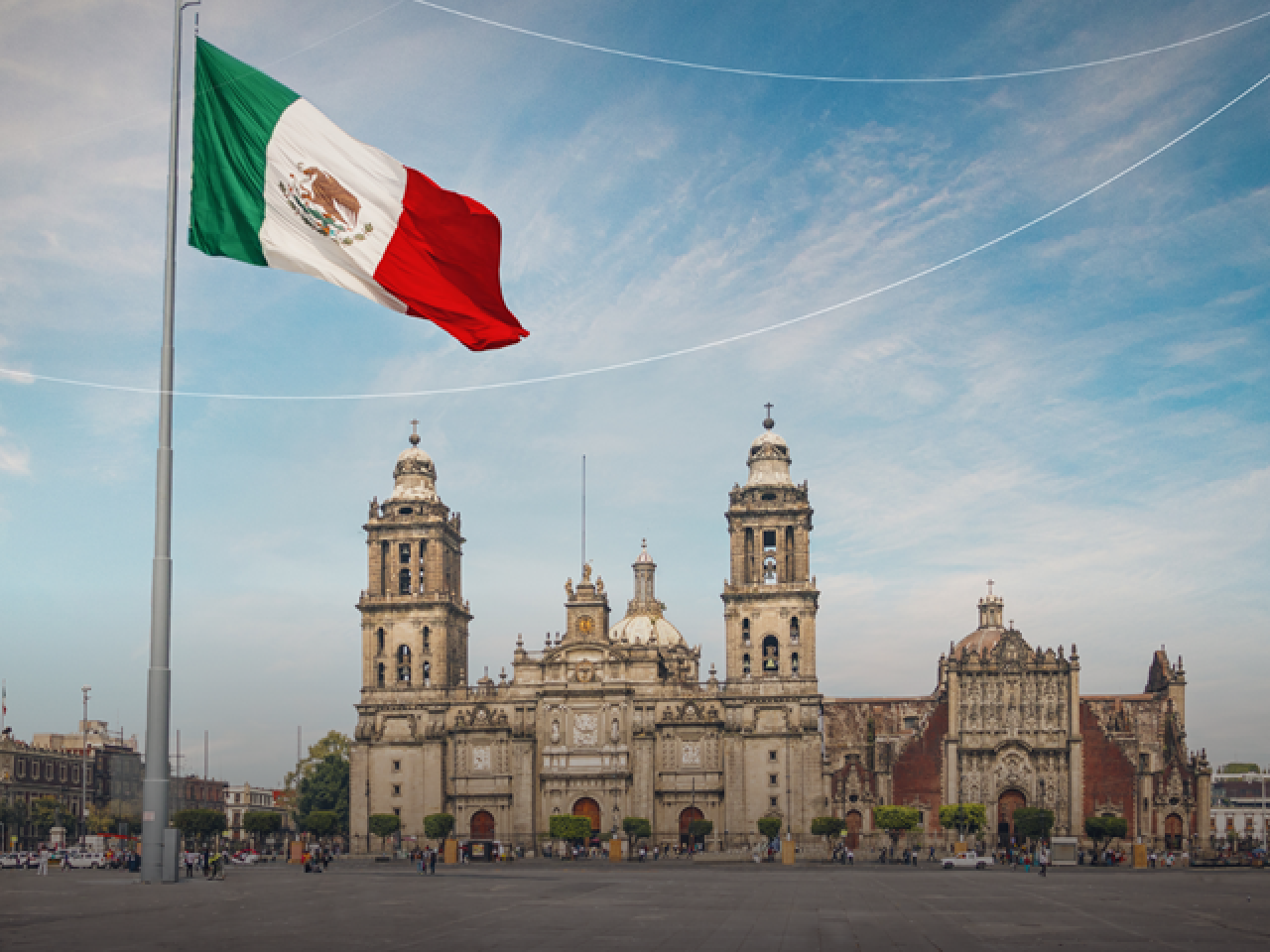 A flag flying in front of a building
