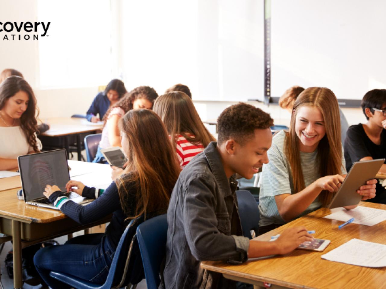 Students studying together in a classroom