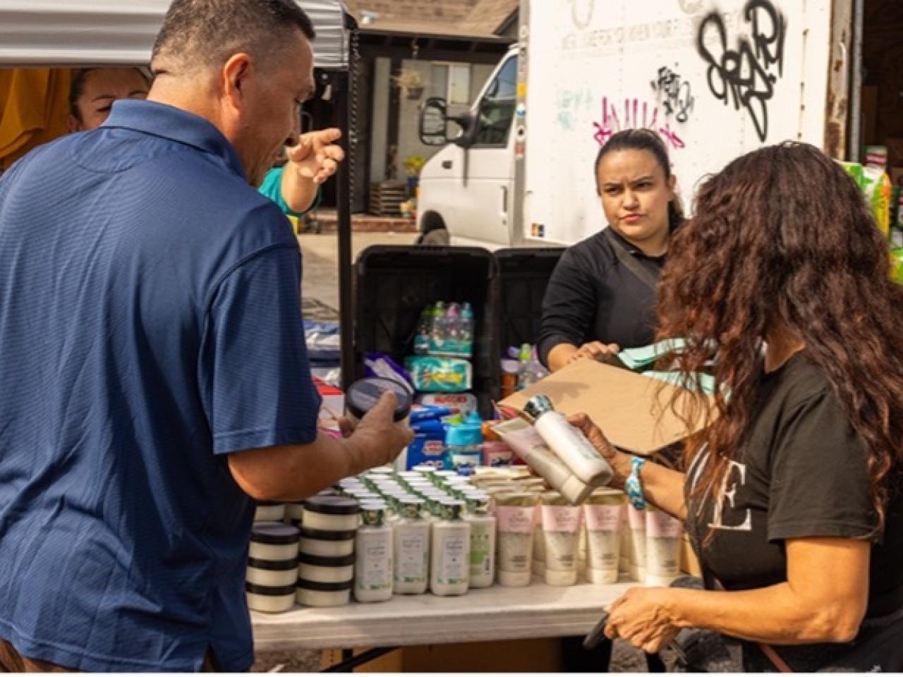 People looking at products