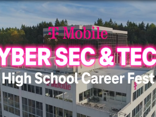 Aerial view of a TMobile corporate building. "TMobile Cyber Sec & Tec High School Career Fest"