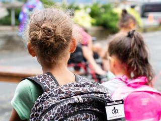 Kids wearing backpacks