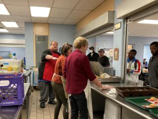 People baking in commercial kitchen