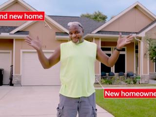Man standing in front of house