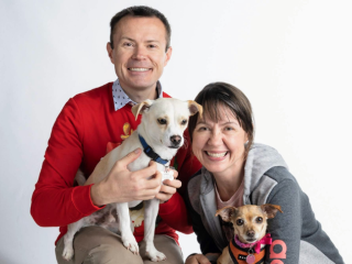 Daniel Grosu with his wife, Simona and their dogs, Simba (left) and Nala (right).