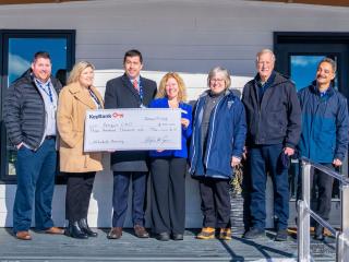 KeyBank and Penquis with grant check.