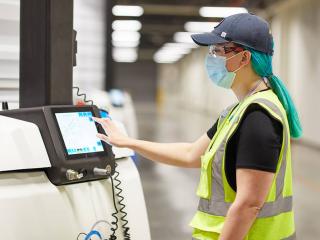 woman operating machinery