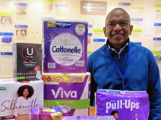 Robert Long alongside Kimberly-Clark products