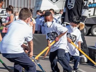 Students play Ball Hockey on the the playground of Longfellow Elementary in Compton, Calif. 