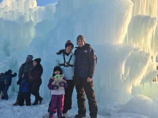 Family in front of a glacier