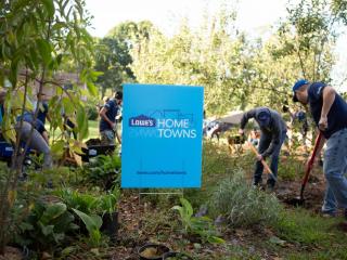 Photo of people working in a garden