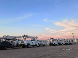Utility trucks ready to be deployed.