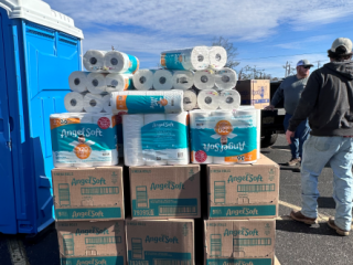Stack of boxes of Angel Soft toilet paper.