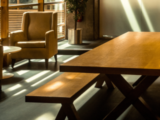 Wood table and bench in room