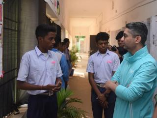 student presenting a poster