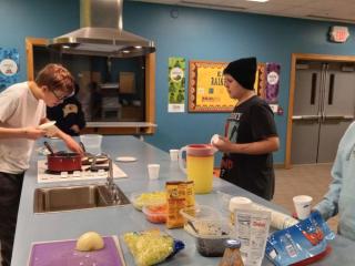 Students making tacos
