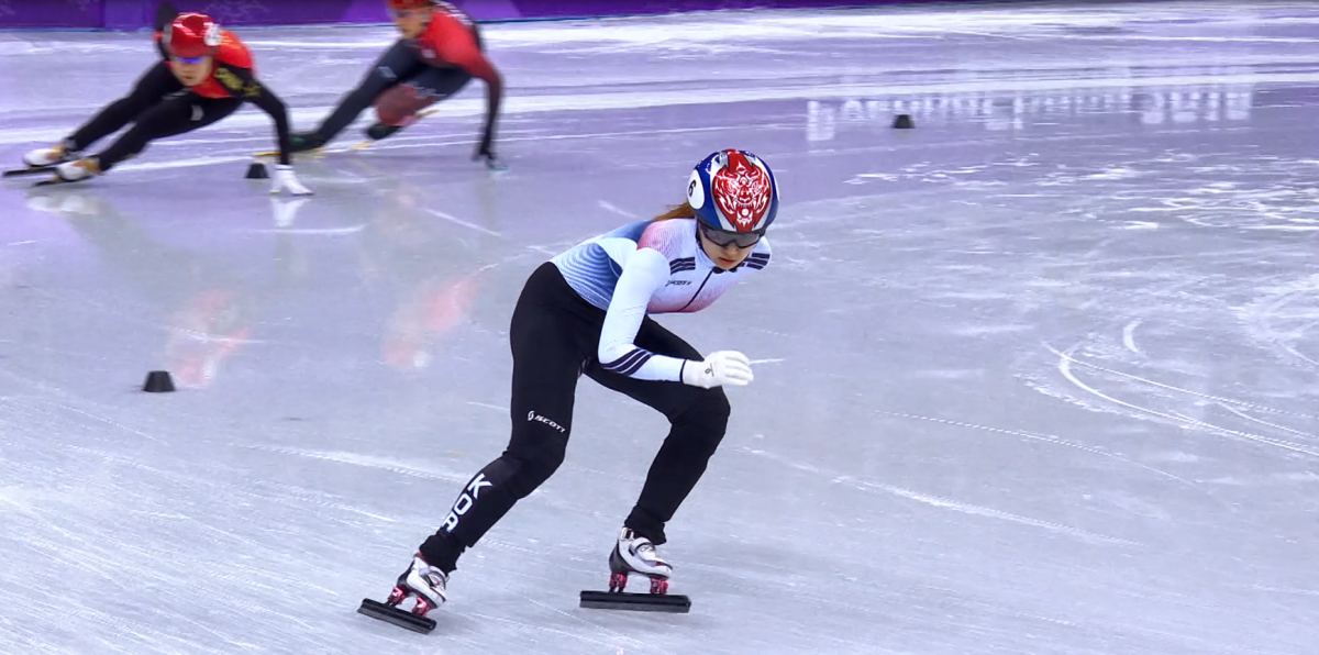 A person in the lead of a speed skating competition