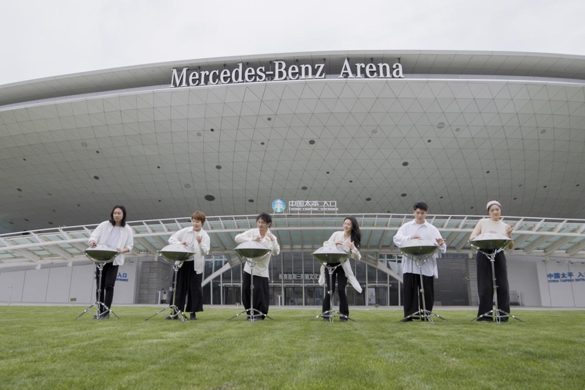 AETHER performing in front of Mercedes-Benz Arena Shanghai.