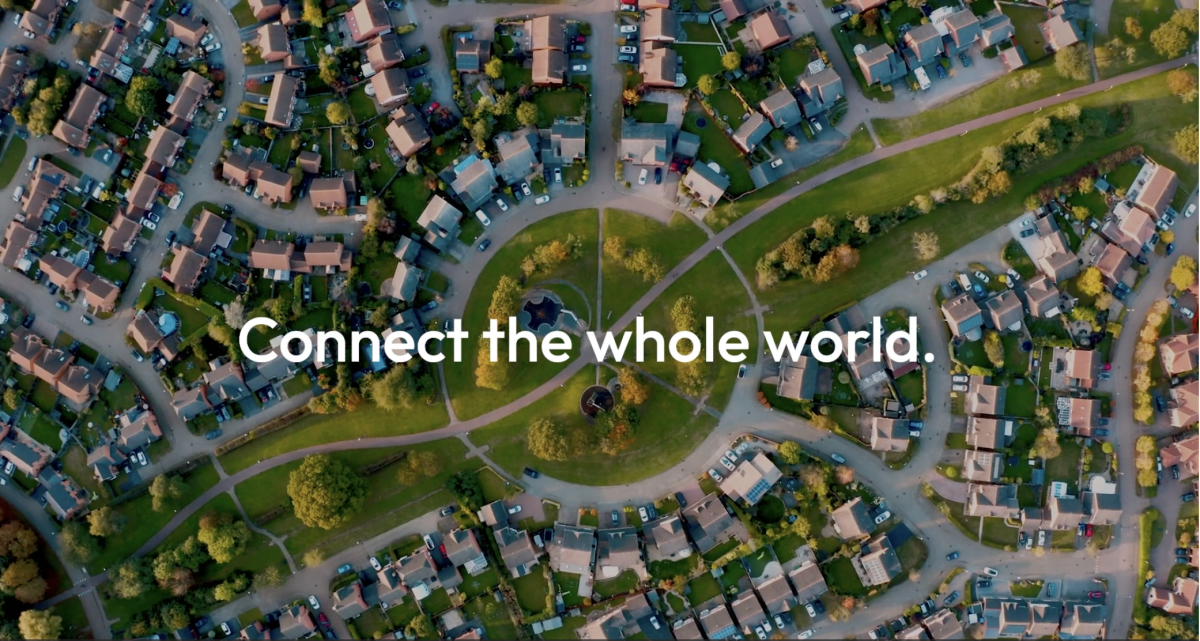 Birds eye view of neighbourhoods with the text 'Connect the whole world' in the centre