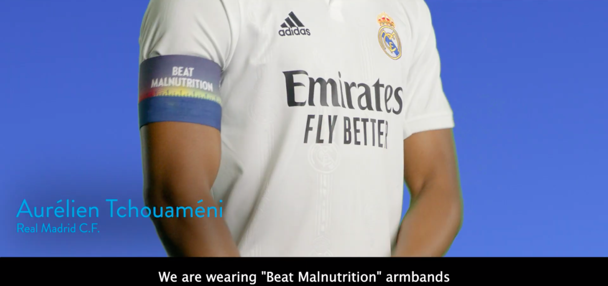footballer wearing beat malnutrition arm band