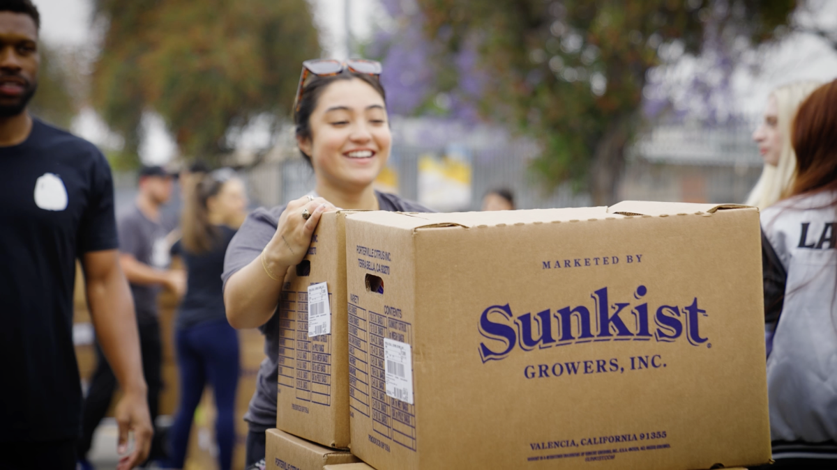 Person stacking cardboard boxes 