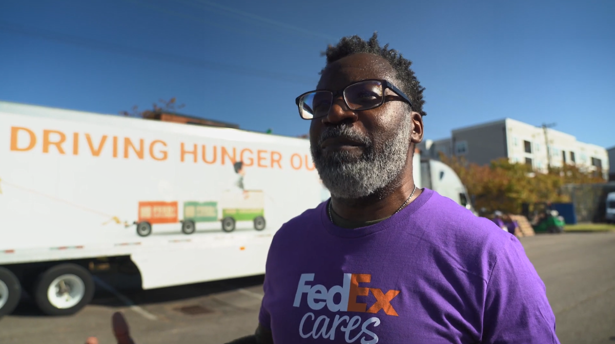 A volunteer at a food drive.