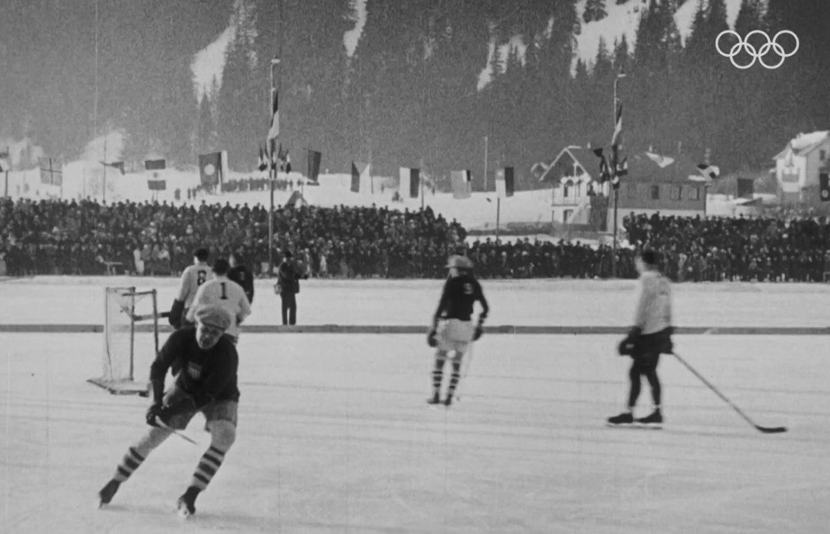 Black and white footage of the first ice hockey olympic games.
