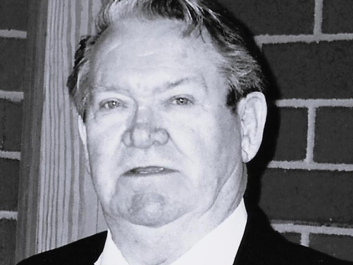 Black and white headshot of a man