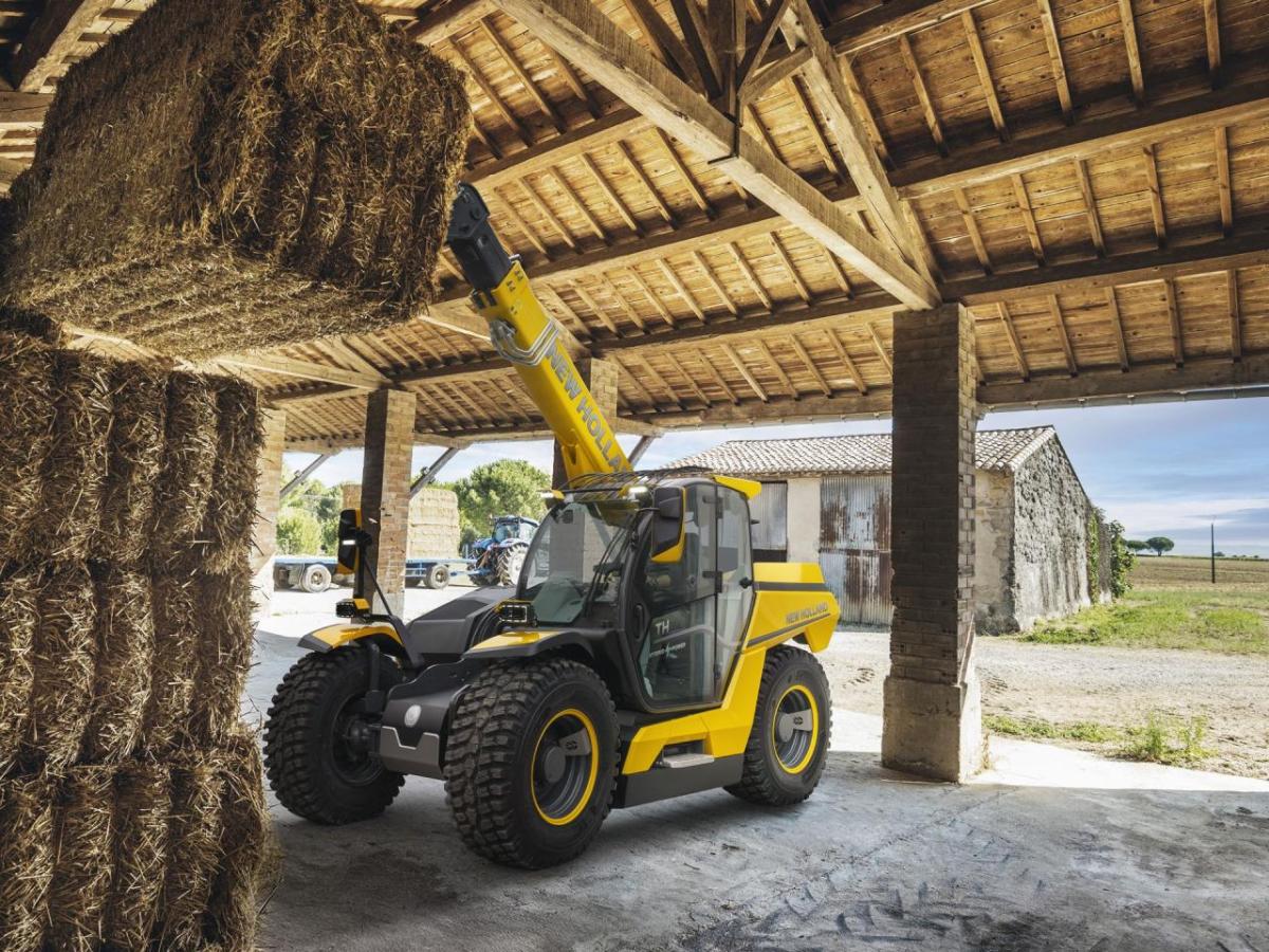 hybrid full-size telehandler prototype lifting hay