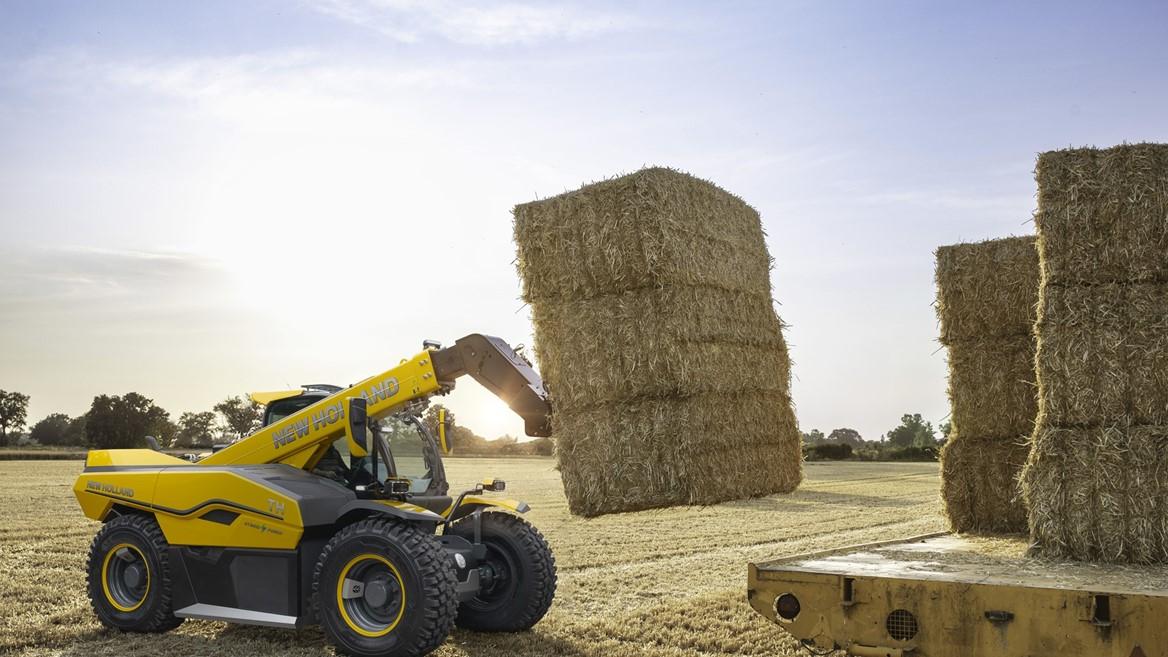 hybrid full-size telehandler prototype lifting hay