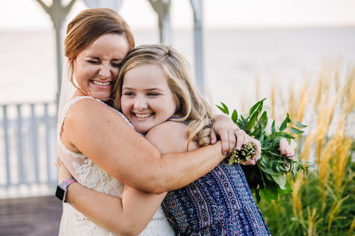 In 2012, Sarah Aiken donated bone marrow to a stranger. Seven years later during her wedding weekend, Ms. Aiken finally met Kinley Strohl, who was 6 years old and battling blood cancer when she received a transplant from Ms. Aiken.Credit...Photography by Brea