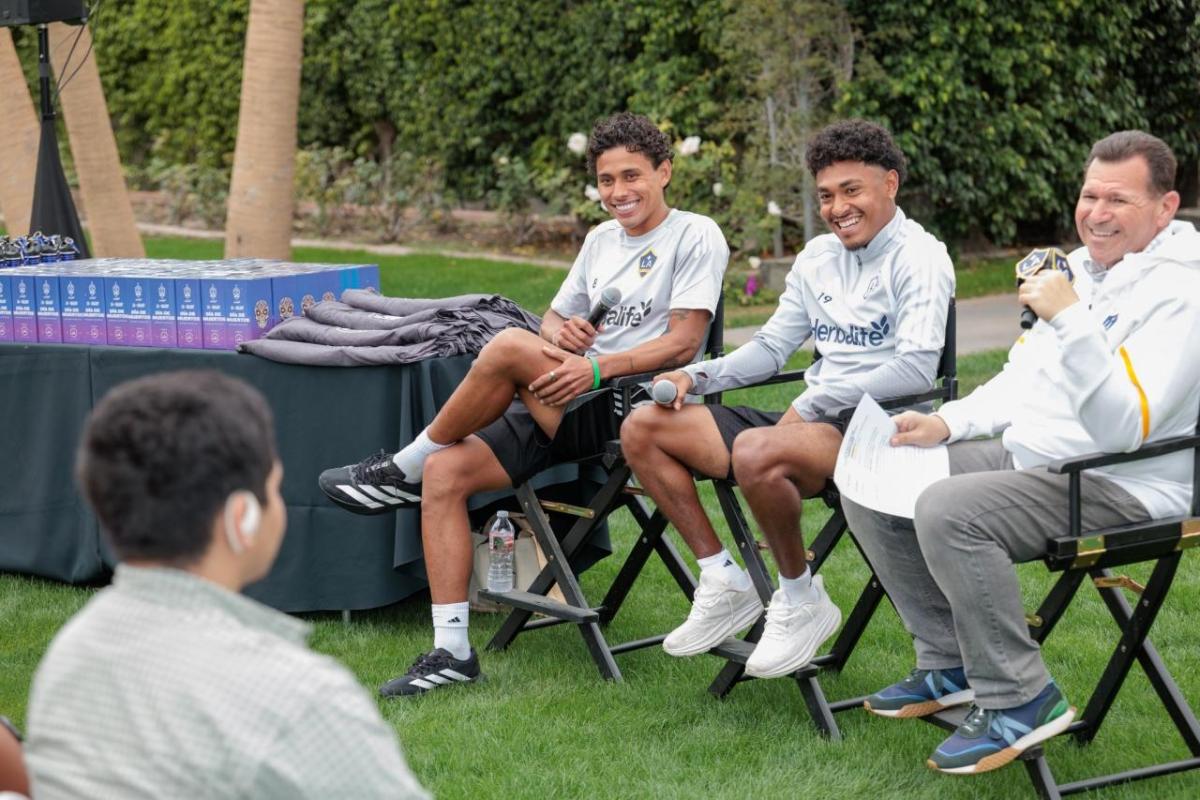 LA Galaxy personnel take part in a conversation with students, sharing personal experiences and advice on perseverance, discipline, and goal‑setting.