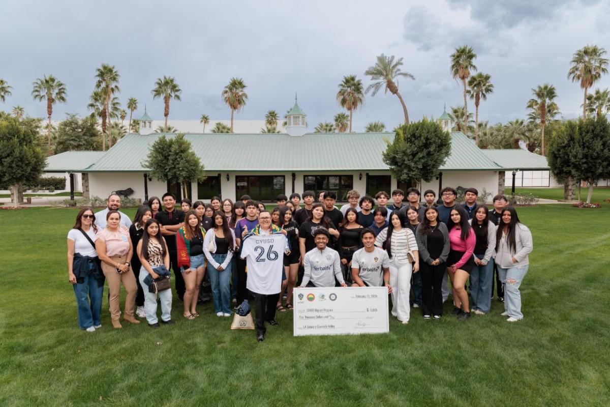 More than 50 students from the Coachella Valley Unified School District’s Migrant Program gather with LA Galaxy representatives to celebrate a multi‑day educational and community experience during the Coachella Valley Invitational.
