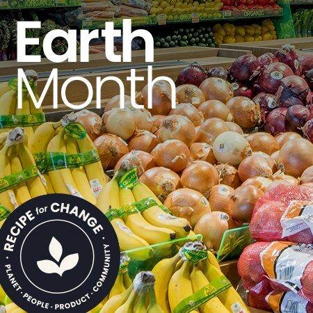 Produce section of grocery store with text "Earth Month" and Albertsons' Recipe for Change logo