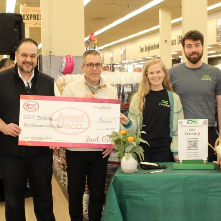 People presenting check at Jewel-Osco Mind, Body, Planet event